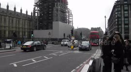 River Thames  view Big Ben with scaffold also London traffic