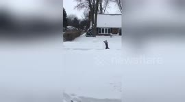 Commuters take to urban skiing after heavy Spring snowfall in Wisconsin