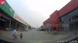 The driver stopped the car at the time when the little boy ran to the road