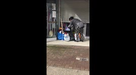 Woman steals goods from outside a UK charity shop