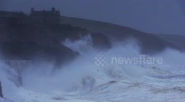 Massive waves batter Cornish coast before mini heatwave hits UK