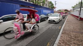 These crazy tuk tuks are decorated as pokemon on the streets o Melacca!