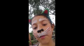 Niña gatico