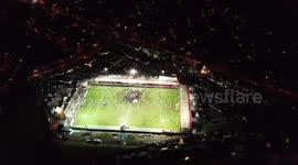 Drone footage shows Accrington Stanley fans' pitch invasion after promotion