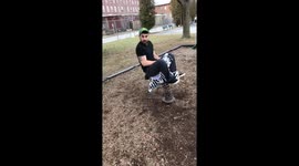 Man on rocking horse at playground