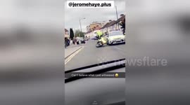 Shocking moment man pushes police officer off motorbike during police chase