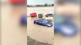 Cars swept away in heavy rain in northwest China