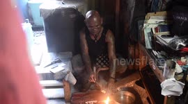 Filipino medicine man cures patients by melting candles
