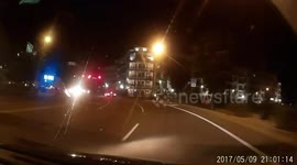 A near miss in front of ambulance