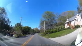 irritated driver passes illegally over double yellow lines