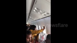 Window breaks in severe turbulence on Air India flight