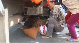 To rescued two men, dozens of people took part in lifting a three-ton truck