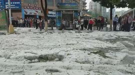 Hailstorm leaves streets in Chinese city covered in thick ice