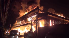 Thai workers run for their lives as massive fire engulfs industrial building