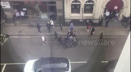 Aerial view shows brawl outside central London Pret a Manger