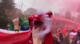 Liverpool fans welcome the Liverpool FC Team bus with Pyro