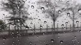 Rain on window during monsoonal rain, Darwin NT.