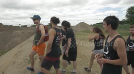 Joke Guy drop into gravel pit with beer