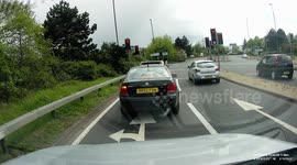 Instant karma: Driver who turns from wrong lane gets pulled over by police