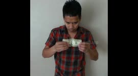 Magician magic mike turns US dollars into Canadian dollars