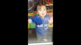 Cute kid develops new way to wash windows