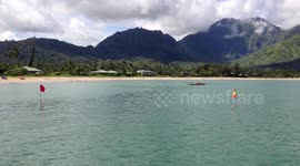 Summer on Hanalei Bay, Kauai: canoeing, swimming, sailing, sunning