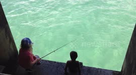 Young fishermen on Hanalei Bay Pier