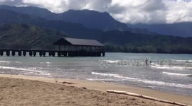 Fun at Black Pot Beach Hanalei Bay Kauai by the Hanalei Pier during better days