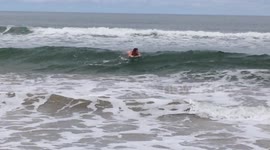 Boogie board body surfing in Hanalei Bay