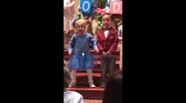 Four-year-old girl steals show at church concert with eager dancing