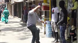 Pranksters dress up as mannequins to startle passers-by