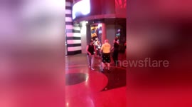 Newsflare Edit - Only in Vegas...dude fight security until he gets tackled by a football team of securities!!!!