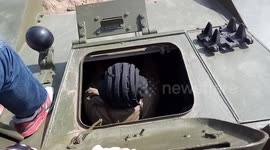 Russian man tossed from tank at military festival
