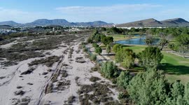 Drone footage of golf course in middle of Dubai desert