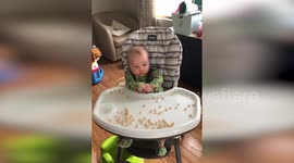 Deaf baby communicates with parents in sign language