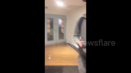 Moment water gushes from ceiling in Leeds student flats flood