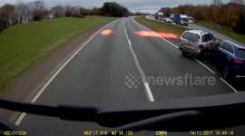 Moment driver pulls out of lay-by in front of truck causing pile-up