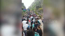 Crowds of tourists brought to a standstill on China's Mount Tai during holidays