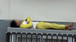 Firefighters rescue boy sleeping on 4th-floor window ledge