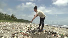 Picking up plastic in a beach in the Guatemalan coast