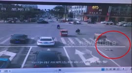 Child falls out of three-wheeler on road in China