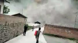 Eyewitnesses scream in panic as huge landslide rocks southern China