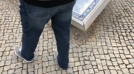 People walking on the old town street Portugal