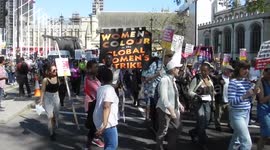 The Windrush demo joins the party passing Parlement turning right heading up to Westminster abby by jim connor