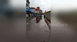 Newsflare Edit - Two men carrying dangerous iron bars on the road