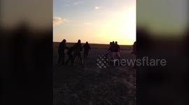 Brutal mobile phone footage has emerged showing a group of masked hunt saboteurs armed with iron bars