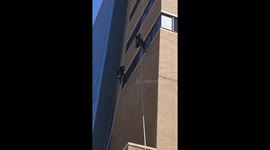 Batman and Spider-Man clean windows at Ontario hospital