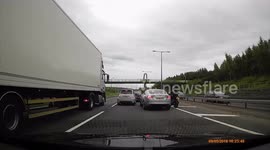 Internet reacts as biker and Jaguar driver get into heated rush-hour argument