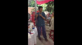 The old woman dancing at his nephew's wedding