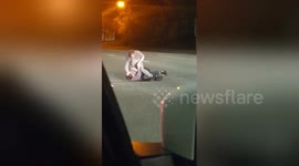 Moment two men filmed fighting in middle of Liverpool A-road